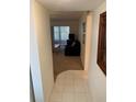 Inviting living room with a cozy seating area, neutral carpet, and sliding glass doors to the lanai at 4502 3Rd Street W Cir # 242, Bradenton, FL 34207