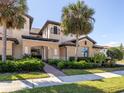Stunning condo with lush landscaping and mature palm trees at 23572 Awabuki Dr # 202, Venice, FL 34293