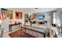 Comfortable living room with modern decor, a large TV, and ample seating, creating an ideal space for Gathering time at 405 Park N Blvd, Venice, FL 34285