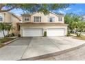 Two-story townhouse with a two-car garage and well-maintained landscaping at 6418 Rosefinch Ct # 103, Lakewood Ranch, FL 34202