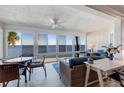 Bright sunroom with expansive windows offering panoramic views of the bay waters at 6500 Flotilla Dr # 126, Holmes Beach, FL 34217