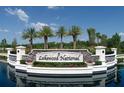 Lakewood National community entrance sign with lush landscaping and water feature at 17704 Gawthrop Dr # 102, Bradenton, FL 34211