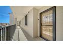 Hallway exterior featuring the door to unit 306 and a view of the city at 6267 Midnight Pass Rd # 306, Sarasota, FL 34242