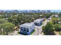 Beautiful aerial view showing the modern homes, lush greenery, and city skyline at 941 N Osprey Ave, Sarasota, FL 34236