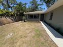 Inviting front yard with a stone walkway leading to the entrance, enhancing the property's welcome at 1461 17Th St, Sarasota, FL 34234