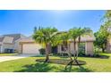 Attractive single-Gathering home with well-maintained landscaping, healthy green lawn and attached two car garage at 620 49Th E St, Bradenton, FL 34208