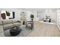 Staged living and dining area showcasing a comfortable seating arrangement and a dining table at 7158 S Leewynn Dr, Sarasota, FL 34240