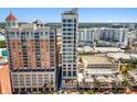 Beautiful aerial view of a condo building in a vibrant urban setting at 33 S Palm # 1103, Sarasota, FL 34236