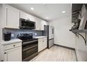 Well-equipped kitchen with stainless steel appliances and ample cabinet space at 1586 Dorgali Dr, Sarasota, FL 34238