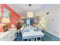 Relaxing dining room with decor; an open plan great for entertaining guests at 3562 Lake Bayshore Dr # 202, Bradenton, FL 34205