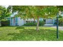 Charming single-story home with well-maintained lawn, mature trees and welcoming curb appeal at 4015 52Nd Street W Ct, Bradenton, FL 34209