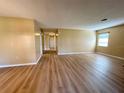 Spacious living room featuring new flooring and neutral wall colors at 6912 10Th W Ave, Bradenton, FL 34209