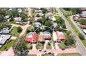 Beautiful single-Gathering home in a well-maintained neighborhood with lush landscaping and mature trees at 7019 10Th S St, St Petersburg, FL 33705