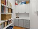 Well-organized storage space with white and gray cabinets, shelves, and a marble-look countertop at 197 Tropicana Dr # 1511, Punta Gorda, FL 33950