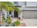 Beautiful exterior with a welcoming front porch and a well-maintained lawn at 5426 Rainwood Meadows Dr, Apollo Beach, FL 33572