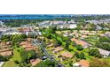 Scenic aerial view of a tranquil residential community with lush greenery and serene water views at 7142 Bright Creek Dr # 35, Sarasota, FL 34231