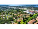 Beautiful aerial shot of a quiet neighborhood with mature trees, well-maintained landscaping, and community charm at 7142 Bright Creek Dr # 35, Sarasota, FL 34231