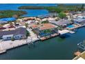 Beautiful waterfront home with a screened pool, and boat lift for enjoying the coastal lifestyle at 10016 Spoonbill E Rd, Bradenton, FL 34209