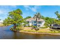 Charming waterfront condo featuring serene water views and inviting outdoor balconies at 304 108Th W St, Bradenton, FL 34209