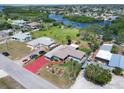 Aerial view of a beautifully landscaped property, showcasing its prime location at 1156 Lemon Bay Dr, Venice, FL 34293