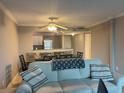 This living room seamlessly connects to the dining area and updated kitchen, perfect for entertaining at 2755 Coconut Bay Ln # 1313 3M, Sarasota, FL 34237