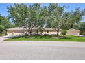 Lovely home with a three-car garage and meticulous landscaping at 14104 E 22Nd Ter, Bradenton, FL 34212
