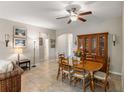 Dining area with natural light and a wooden table with seating for six at 6124 35Th E Ct, Bradenton, FL 34203