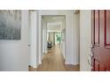 Bright entryway featuring wood floors and an open view into the living spaces at 2907 61St E Ter, Ellenton, FL 34222