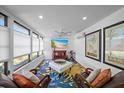 Bright living room featuring ample natural light, modern decor, and comfortable seating at 3333 26Th E Ave # 1004, Bradenton, FL 34208