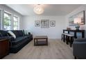 Inviting living room featuring ample natural light and modern decor at 466 Sunnyside Dr, Venice, FL 34293