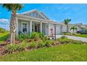 Alluring single-story home complemented by colorful landscaping and an attractive paver driveway at 8107 Slipway Dr, Sarasota, FL 34240