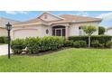 Well-maintained home with tidy landscaping, including a trimmed hedge at 10008 Sugar Mill Dr, Bradenton, FL 34212