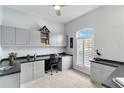 Inviting office with built-in cabinets, ample desk space, and natural light at 10008 Sugar Mill Dr, Bradenton, FL 34212