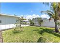 Expansive backyard with white fencing, offering privacy and space for outdoor activities at 3417 50Th W St, Bradenton, FL 34209