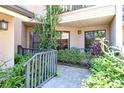 Private patio with pavers and lush landscaping, offering a serene outdoor space at 5230 Landings Blvd # 101, Sarasota, FL 34231
