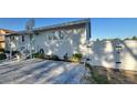 A nicely landscaped home with a gray brick driveway and a fenced yard at 5231 32Nd E St, Bradenton, FL 34203