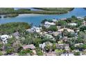 An aerial view of the property highlighting its location near the water at 5324 Siesta Ct, Sarasota, FL 34242