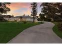 A well maintained single-story home with mature trees and long driveway at 1411 70Th Nw St, Bradenton, FL 34209