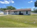 Charming single story home featuring an attached two car garage and well maintained lawn at 2716 81St E Ave, Ellenton, FL 34222