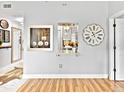 Spacious living room with hardwood floors and neutral decor at 3730 Cadbury Cir # 631, Venice, FL 34293