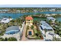 Gorgeous home with a private pool and boat dock, situated on a waterfront lot with canal access at 416 Casey Key Rd, Nokomis, FL 34275