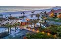 Picturesque beach access with a gazebo and boardwalk leading to the beach and ocean at 6236 Midnight Pass Rd # 300, Sarasota, FL 34242