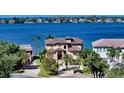 Beautiful two-story home with a lush front yard and inviting curb appeal at 7342 Captain Kidd Ave, Sarasota, FL 34231