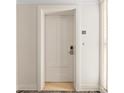 White paneled door to the unit featuring a brushed metal handle, peephole, and unit number at 915 Seaside Dr # 405 Weeks 22-23, Sarasota, FL 34242