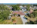 Aerial view of a home highlighting its landscaping, fenced backyard, and proximity to other properties at 3736 Fontainebleau St, North Port, FL 34287