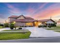 Charming single-Gathering home boasts a circular driveway, well-manicured lawn, and a lovely landscape design at 4405 Harbor Blvd, Port Charlotte, FL 33952