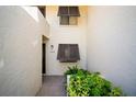 Well-maintained condo with private entrance surrounded by lush tropical landscaping at 4580 Longwater # 61, Sarasota, FL 34235