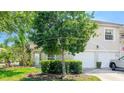 Beautiful two-story home featuring a well-maintained lawn and two-car garage at 6770 Fairway Gardens Dr, Bradenton, FL 34203