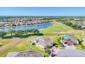 Beautiful home located on a well-manicured lot, backing onto a golf course and lake at 302 Crystal Downs Ct, Sun City Center, FL 33573