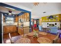 View of kitchen, dining, and living room areas at 610 Poinsettia Rd, Nokomis, FL 34275